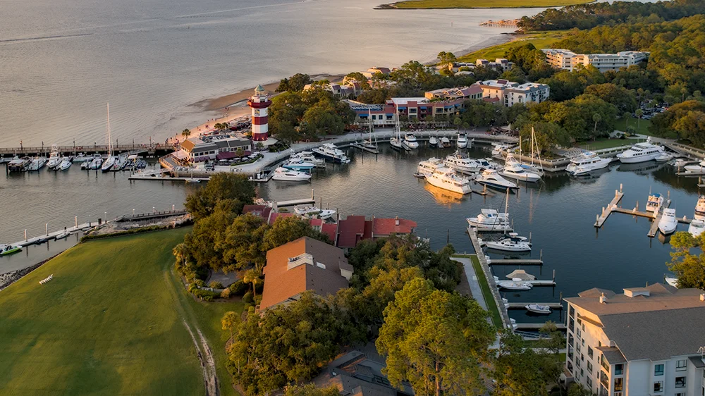 Sunset view of the Harbour Town Marina on Hilton Head Island at sunset captured with a drone camera