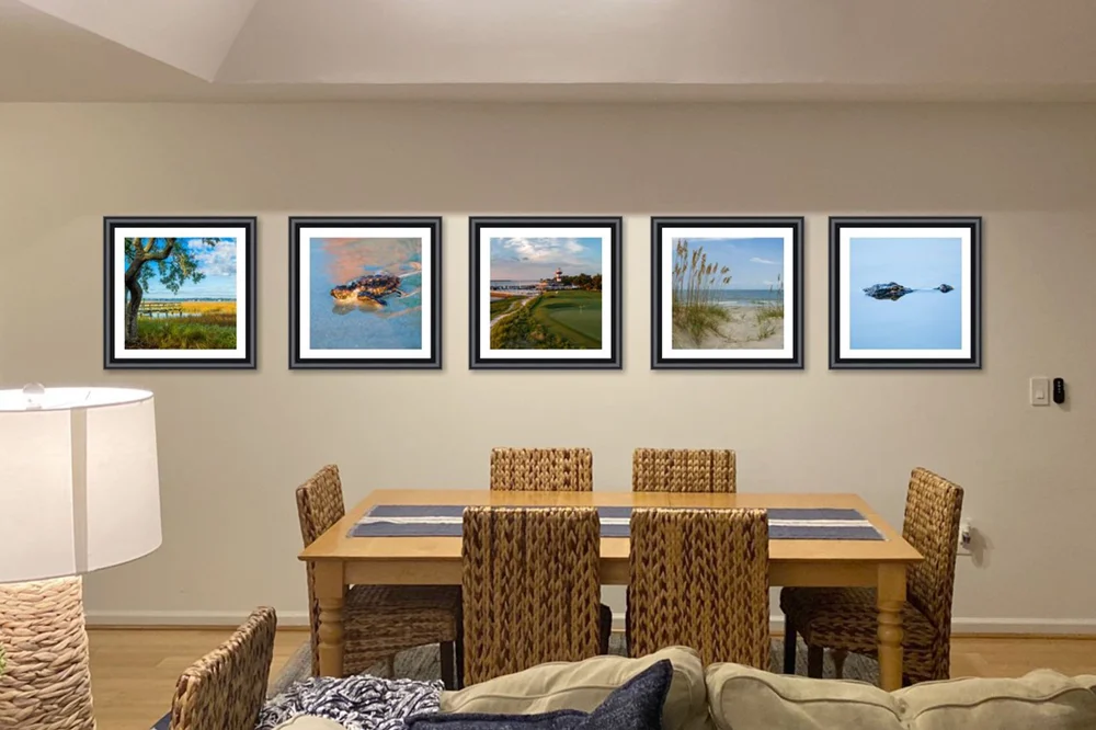Dining room with a single row of five  custom fine art photography color pictures on wall